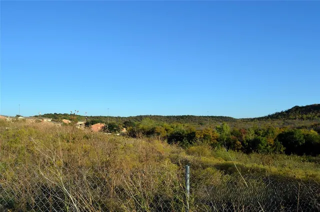 a view of mountain with ocean view