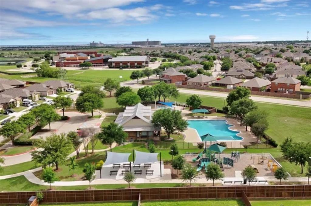 8812 Russano Road Fort Worth, TX 76131 - Photo 29 of 40 Community amenities featuring a swimming pool, playground, and covered seating areas