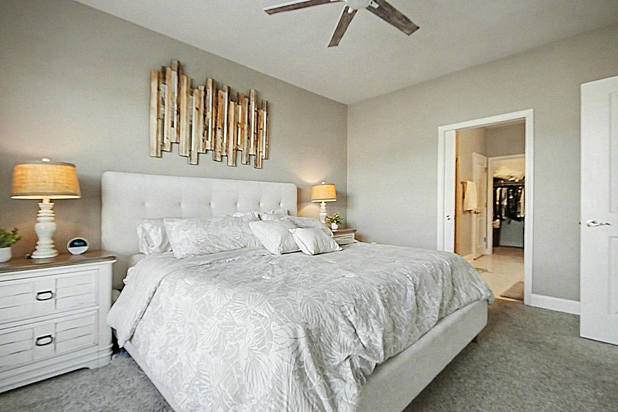 5830 Cremona Drive Myrtle Beach, SC 29577 - Photo 19 of 39 Carpeted bedroom featuring ceiling fan and baseboards