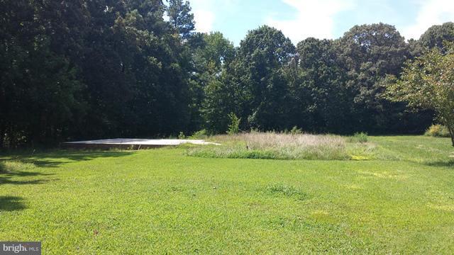 13765 Point Lookout Road Ridge, MD 20680 - Photo 3 of 15 a view of a yard