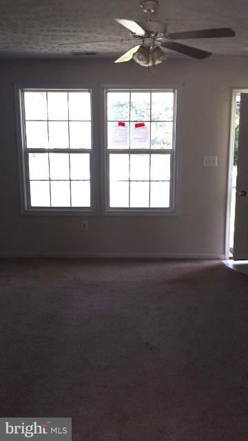 13765 Point Lookout Road Ridge, MD 20680 - Photo 4 of 15 an empty room with a window