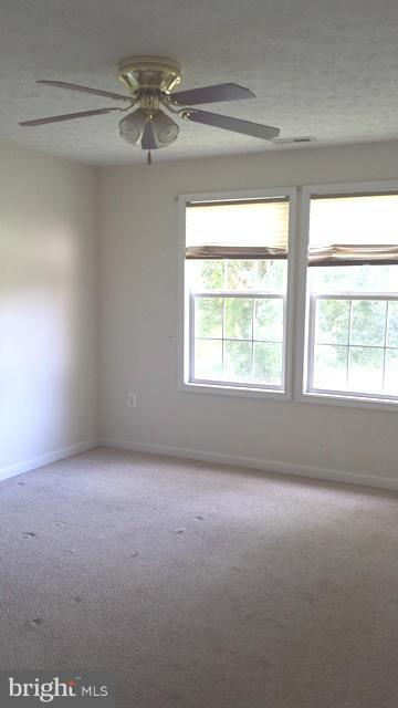 13765 Point Lookout Road Ridge, MD 20680 - Photo 7 of 15 an empty room with a window