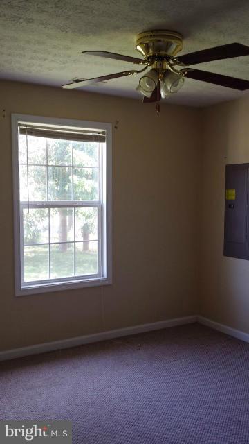 13765 Point Lookout Road Ridge, MD 20680 - Photo 8 of 15 a view of an empty room and window