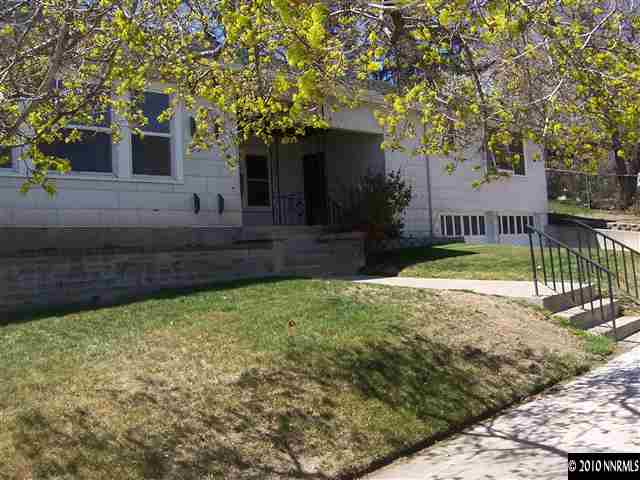 761 West Street Reno, NV 89503 - Photo 1 of 13 a view of a house with a yard