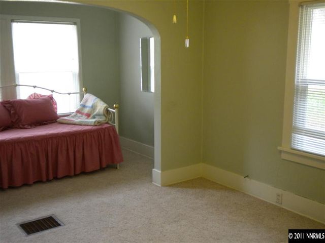 761 West Street Reno, NV 89503 - Photo 5 of 13 a bedroom with a bed and a window