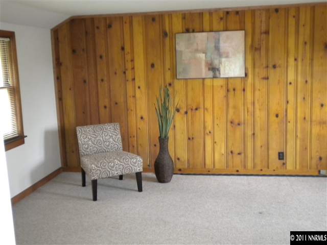 761 West Street Reno, NV 89503 - Photo 9 of 13 a living room with a chair and next to door