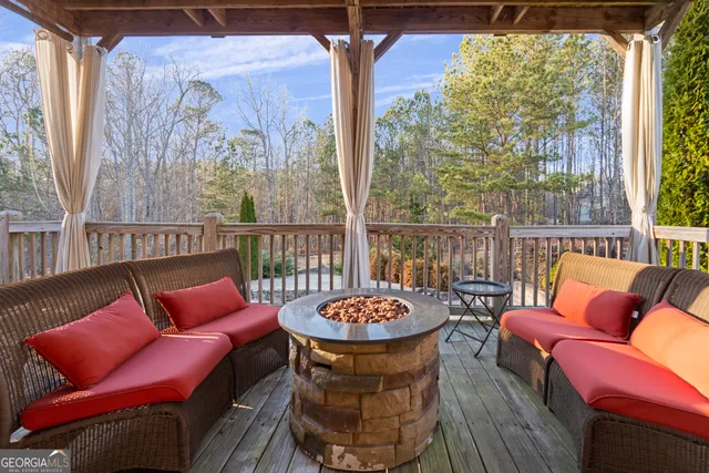 a outdoor living with furniture and a garden