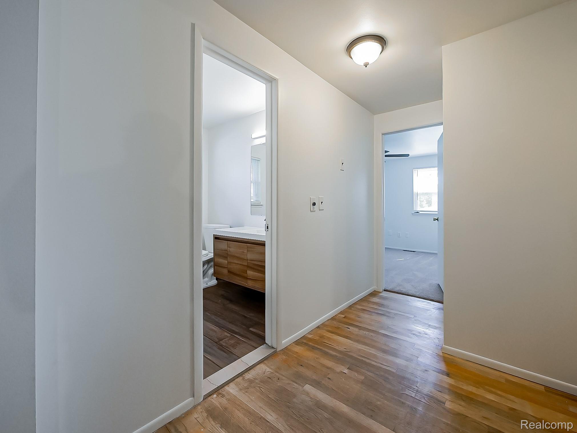 42195 Park Ridge Road Novi, MI 48375 - Photo 28 of 52 Hardwood flooring throughout the hallway