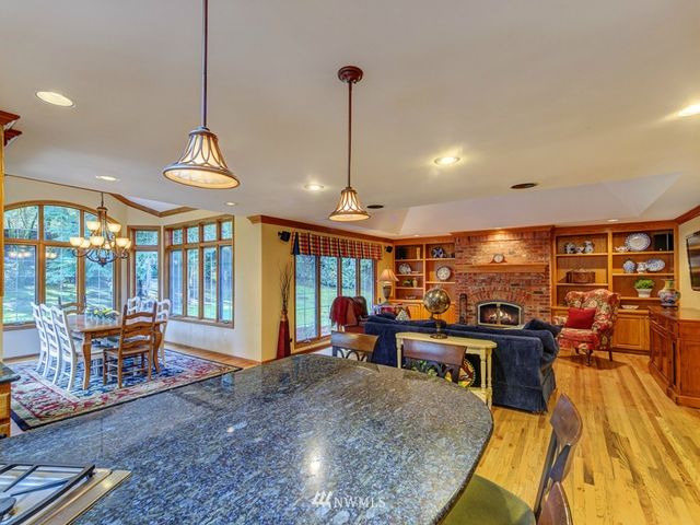 a view of a living room and dining room