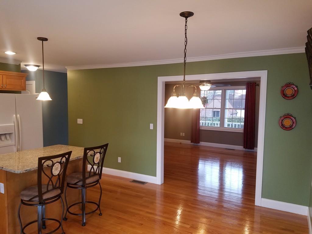18 Channing Road East Longmeadow, MA 01108 - Photo 14 of 40 a view of a dining room with furniture window and wooden floor