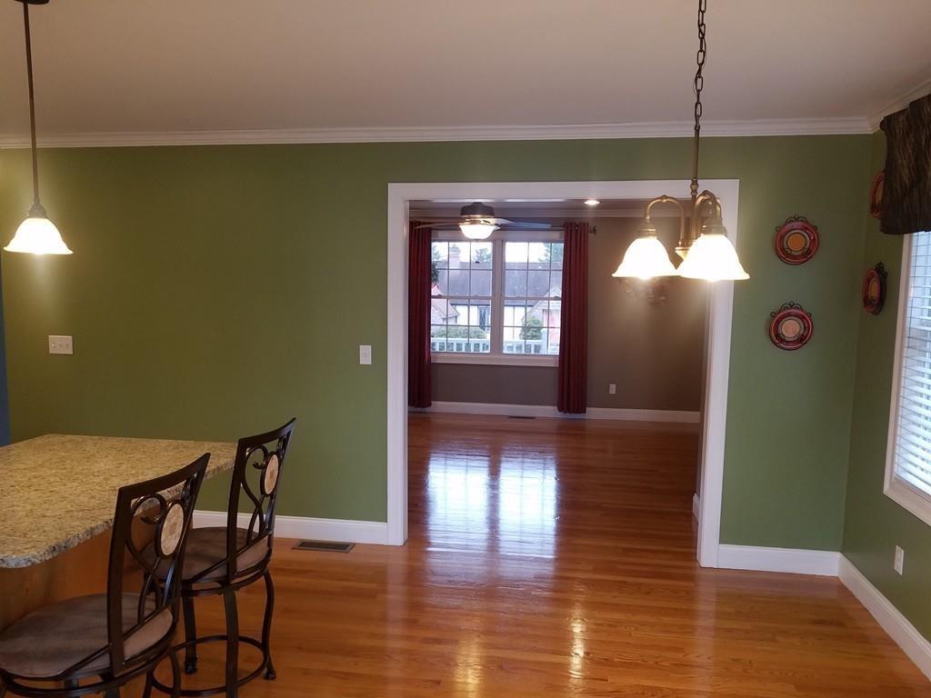 18 Channing Road East Longmeadow, MA 01108 - Photo 15 of 40 a dining room with furniture and wooden floor