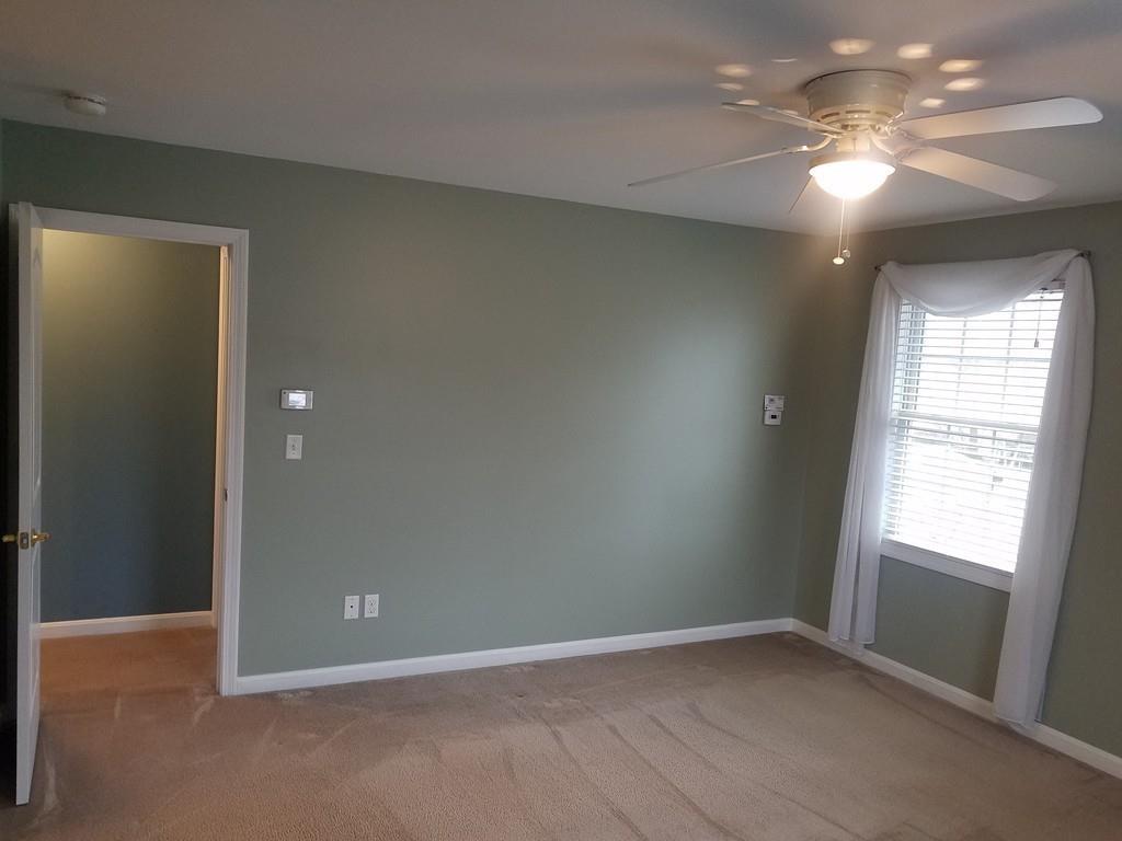 18 Channing Road East Longmeadow, MA 01108 - Photo 24 of 40 an empty room with windows and fan