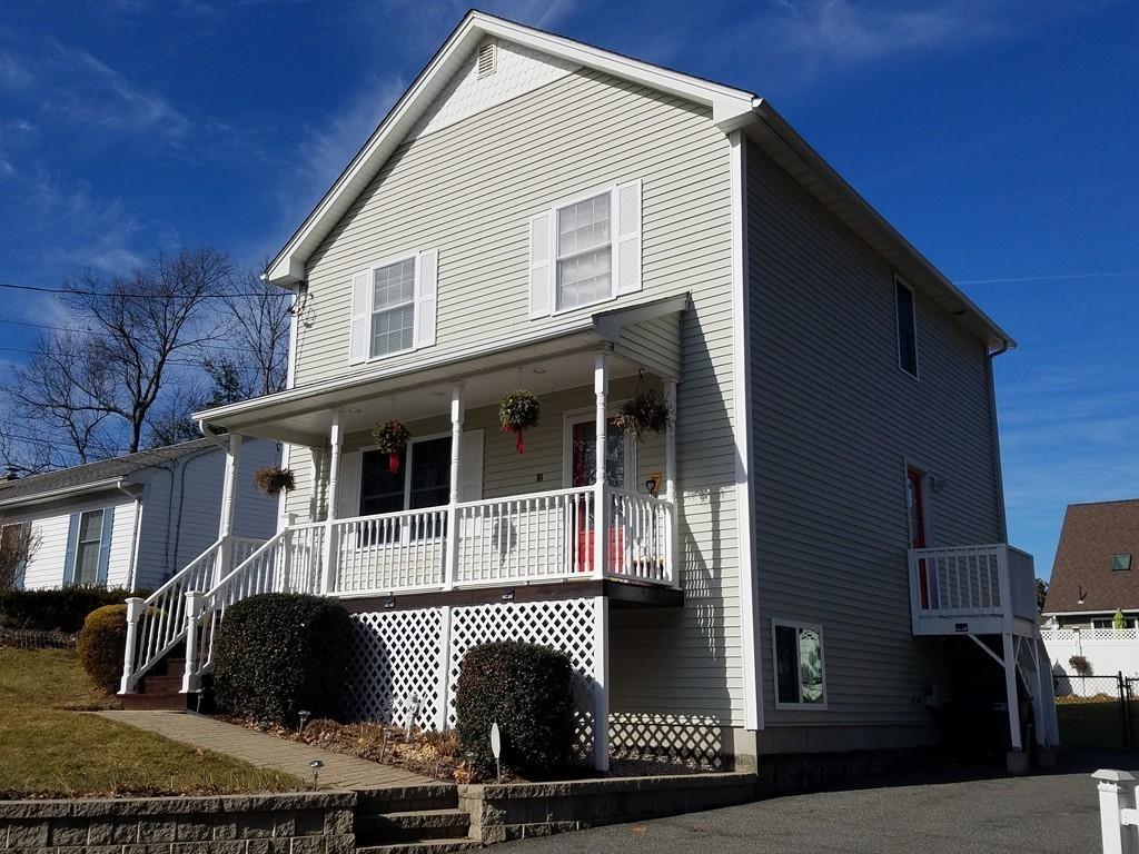 18 Channing Road East Longmeadow, MA 01108 - Photo 4 of 40 a front view of a house with a garden