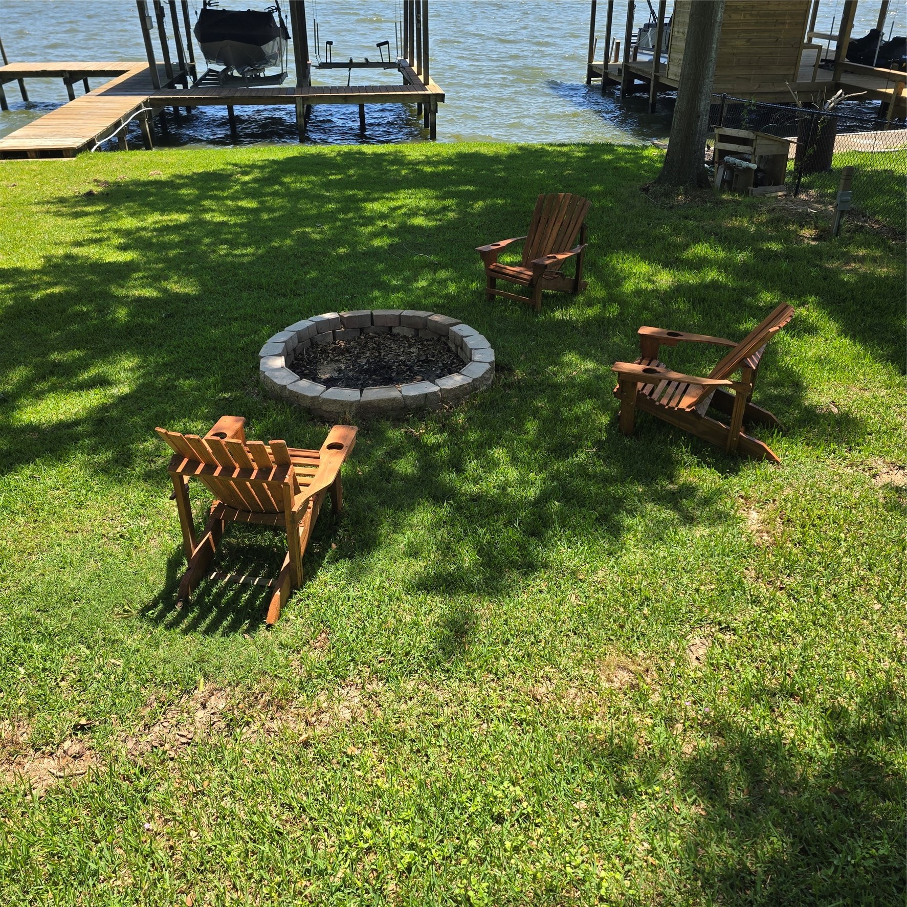 275 Sam Houston Loop Point Blank, TX 77364 - Photo 4 of 34 a backyard of a house with table and chairs