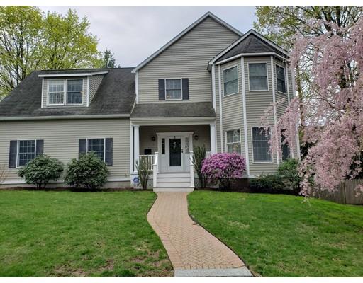 41 Trueman Street Needham, MA 02494 - Photo 1 of 24 a front view of a house with a garden and plants