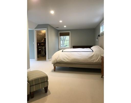41 Trueman Street Needham, MA 02494 - Photo 15 of 24 a bedroom with a bed and a couch