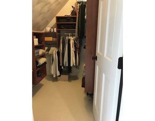 41 Trueman Street Needham, MA 02494 - Photo 17 of 24 a view of walk in closet with clothes