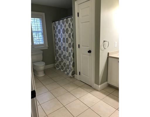 41 Trueman Street Needham, MA 02494 - Photo 20 of 24 a bathroom with a toilet and a shower