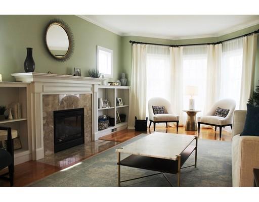 41 Trueman Street Needham, MA 02494 - Photo 2 of 24 a living room with furniture and a fireplace