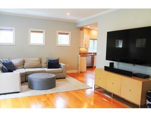 41 Trueman Street Needham, MA 02494 - Photo 9 of 24 a living room with furniture and a flat screen tv