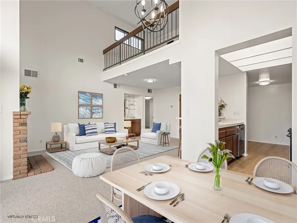 a living room with furniture and a table