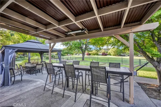 a view of an outdoor space with furniture