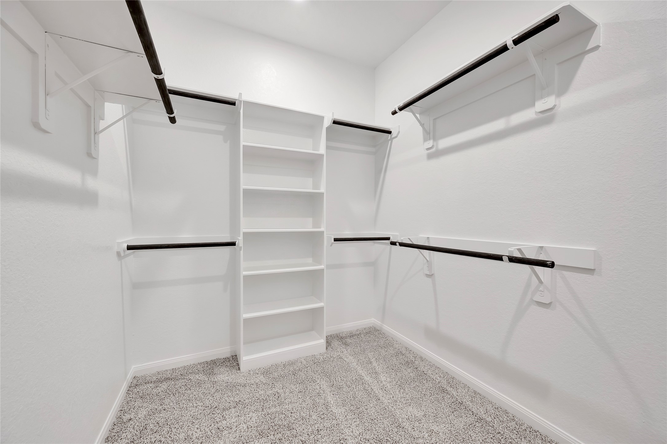 420 Sunrise Ranch Drive Montgomery, TX 77316 - Photo 14 of 26 a view of walk in closet with empty racks