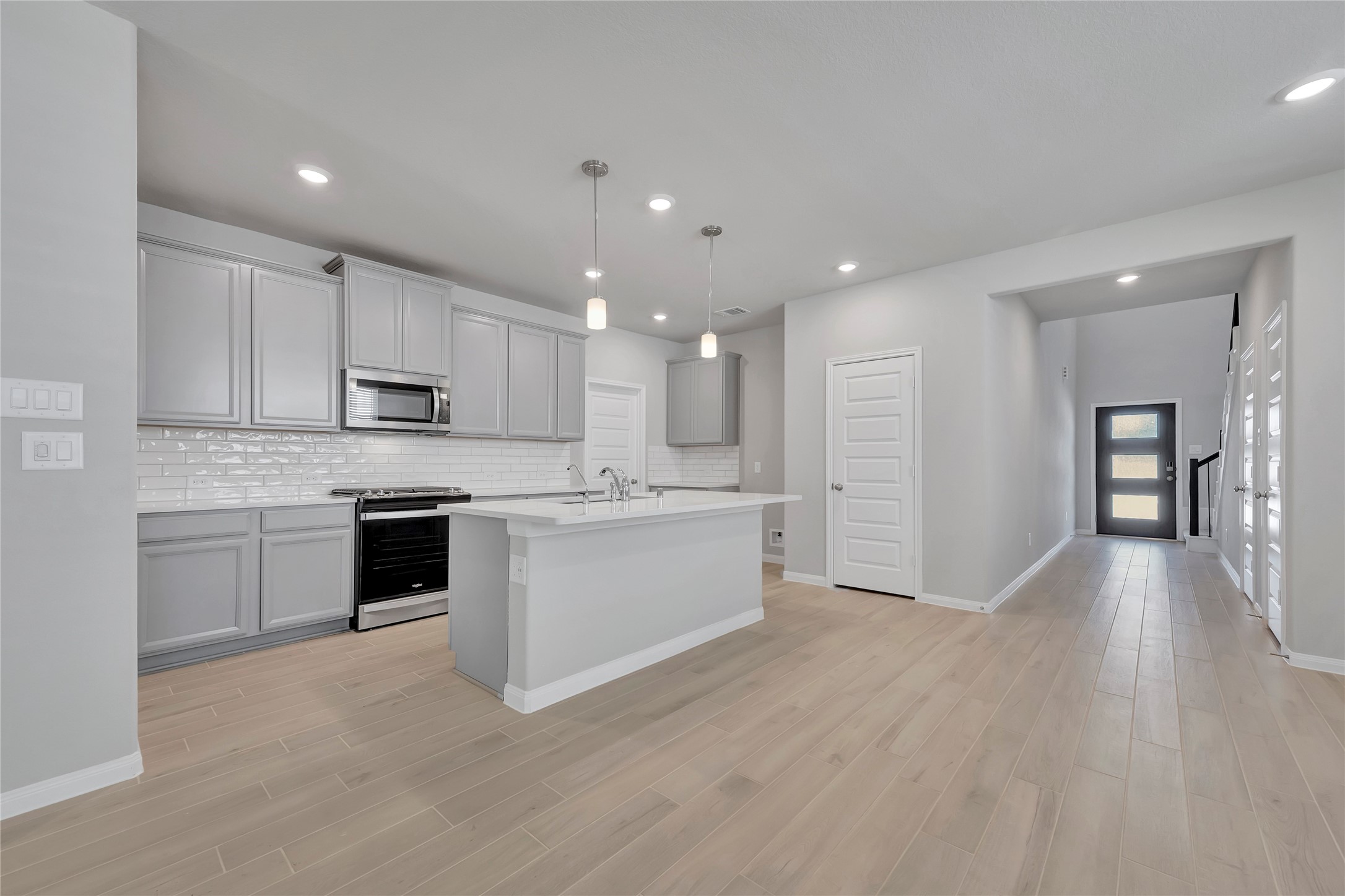 420 Sunrise Ranch Drive Montgomery, TX 77316 - Photo 2 of 26 a large kitchen with cabinets