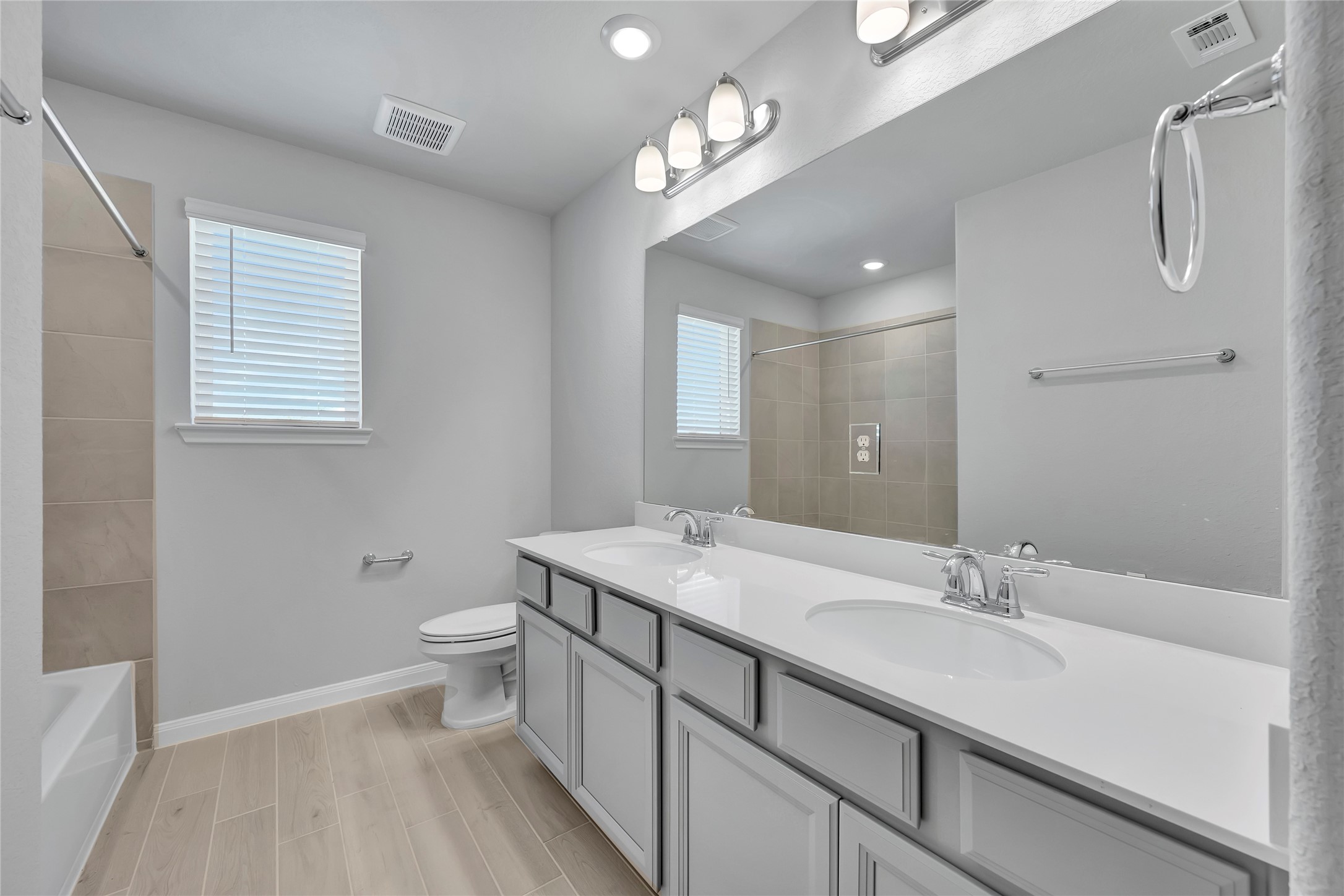 420 Sunrise Ranch Drive Montgomery, TX 77316 - Photo 22 of 26 a bathroom with a sink a toilet and shower