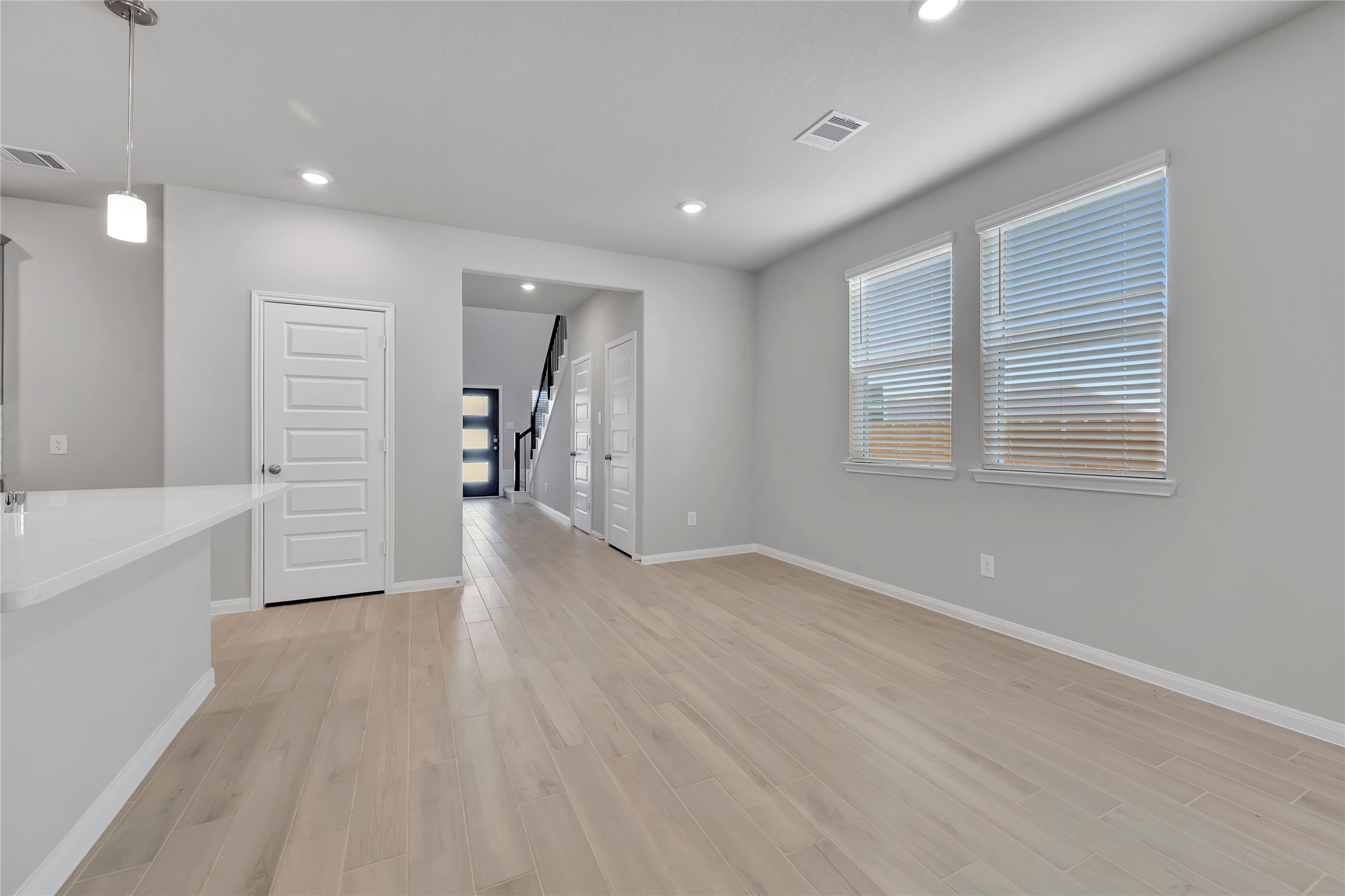 420 Sunrise Ranch Drive Montgomery, TX 77316 - Photo 5 of 26 a view of an empty room with wooden floor and a window
