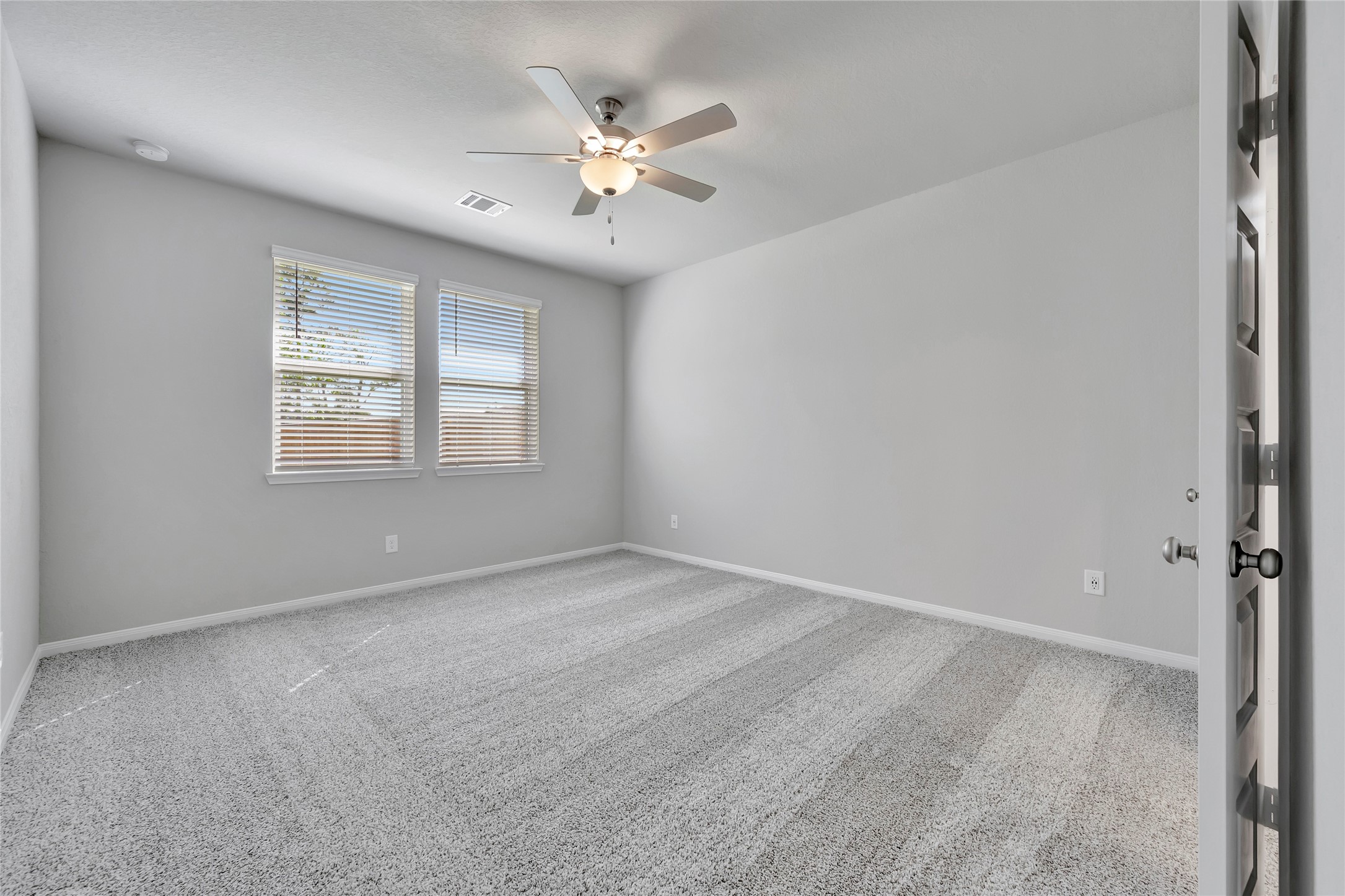 420 Sunrise Ranch Drive Montgomery, TX 77316 - Photo 9 of 26 a view of an empty room with chandelier fan and window