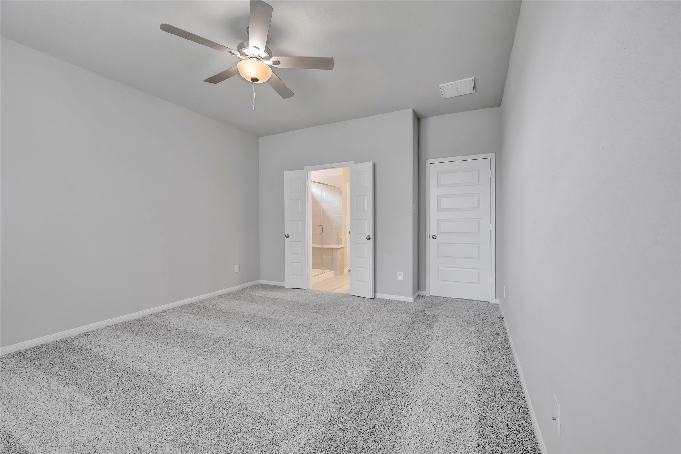 420 Sunrise Ranch Drive Montgomery, TX 77316 - Photo 10 of 26 a view of an empty room with a ceiling fan