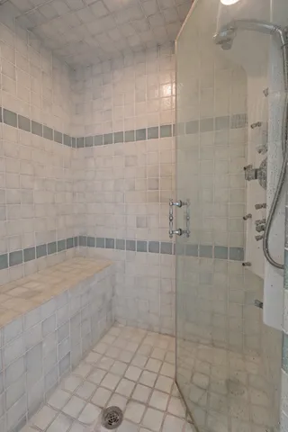 a bed room with a bed and a tv