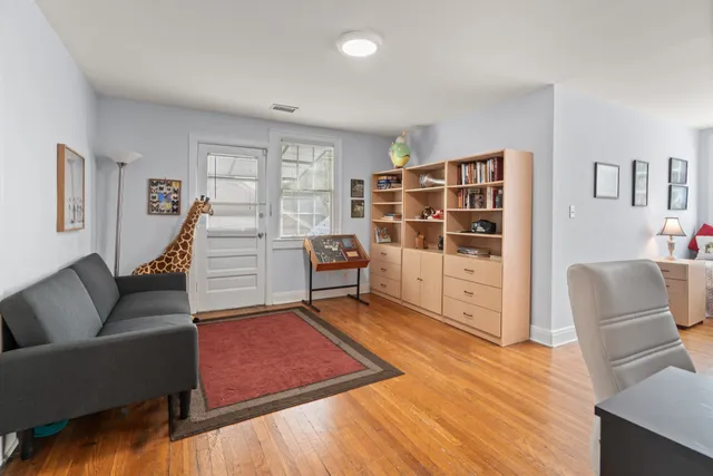 a living room with furniture and window