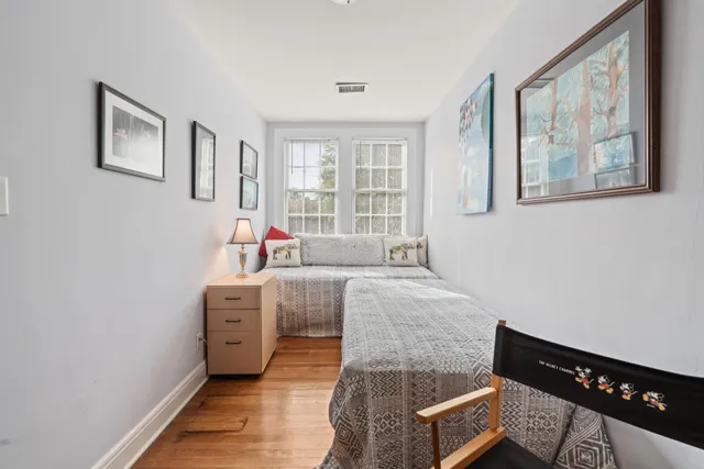 a kitchen with a sink a stove and cabinets