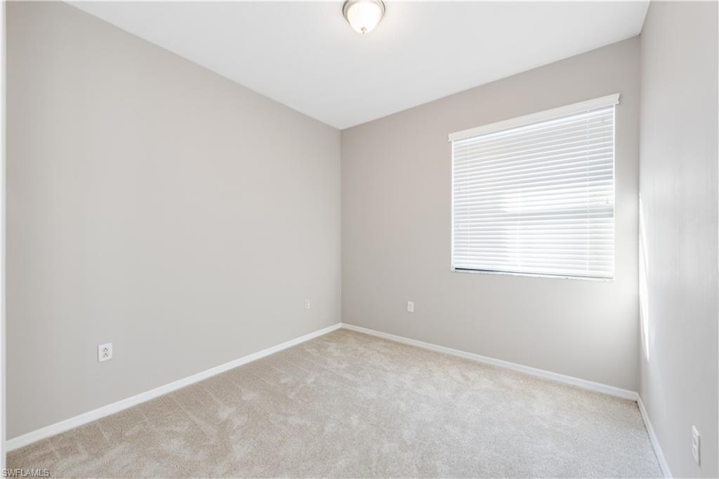 8732 Madrid Circle Naples, FL 34104 - Photo 9 of 15 Guest Bedroom