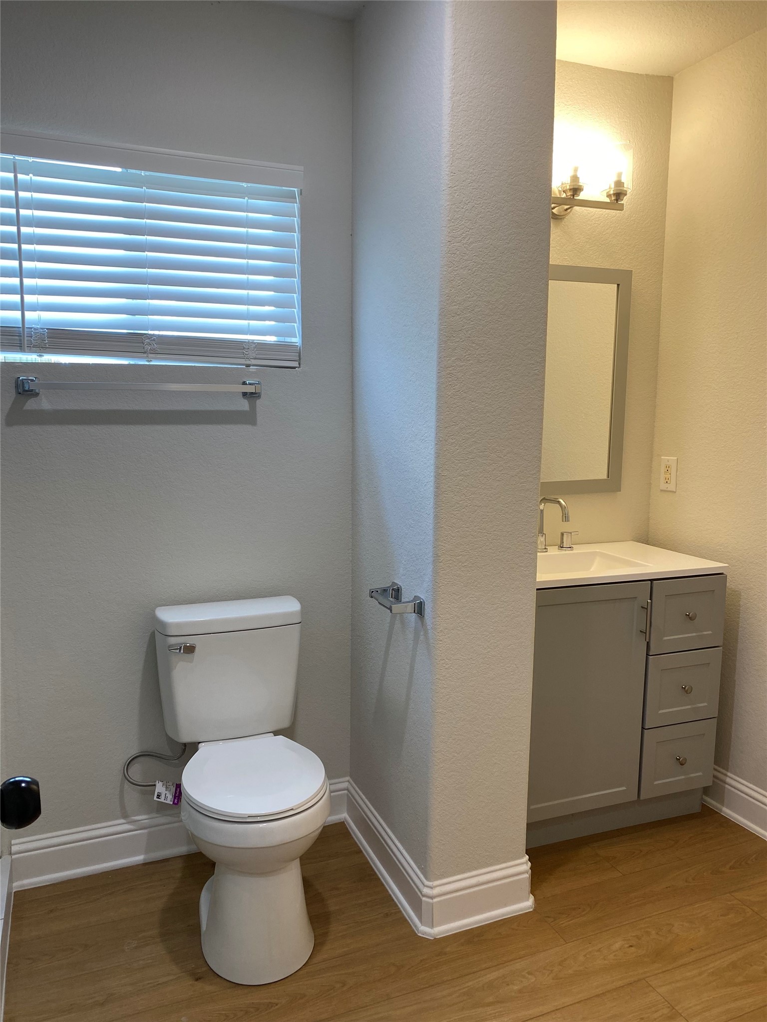 4901 Winnetka Street Houston, TX 77021 - Photo 20 of 45 a bathroom with a toilet sink and a mirror
