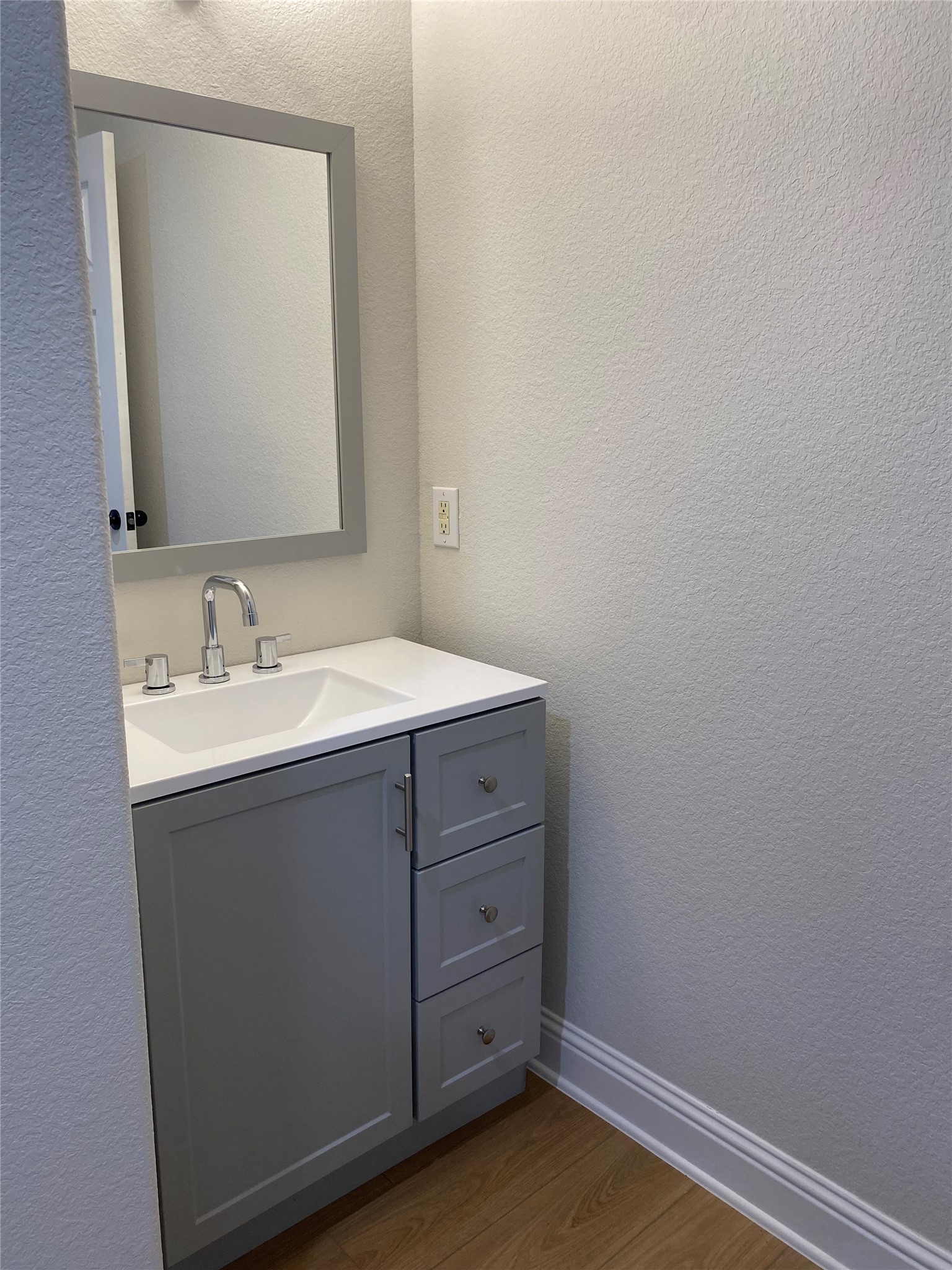 4901 Winnetka Street Houston, TX 77021 - Photo 22 of 45 a bathroom with a sink vanity and a mirror