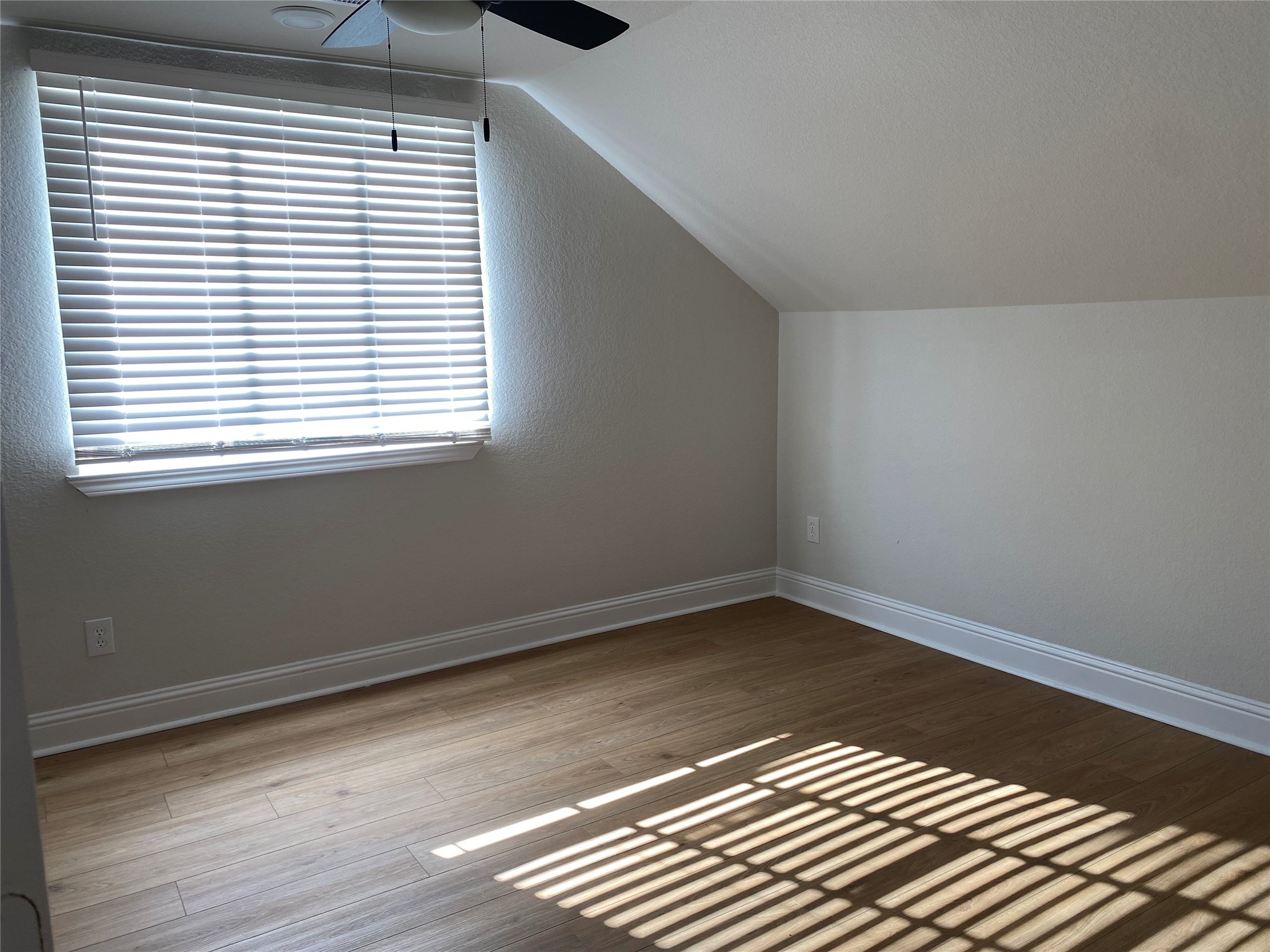 4901 Winnetka Street Houston, TX 77021 - Photo 32 of 45 a view of a room with wooden floor and a window