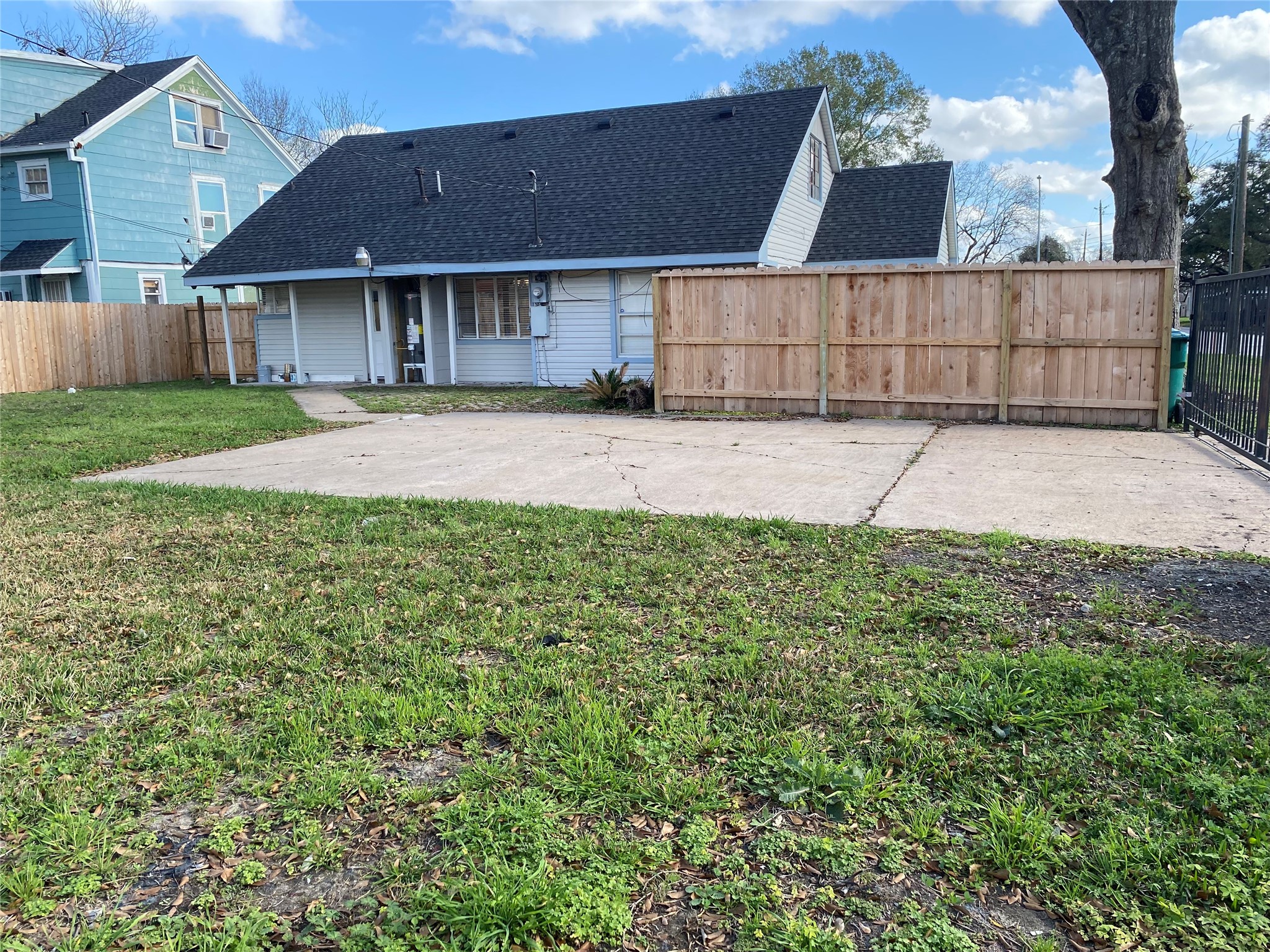 4901 Winnetka Street Houston, TX 77021 - Photo 41 of 45 a front view of a house with a yard and trees