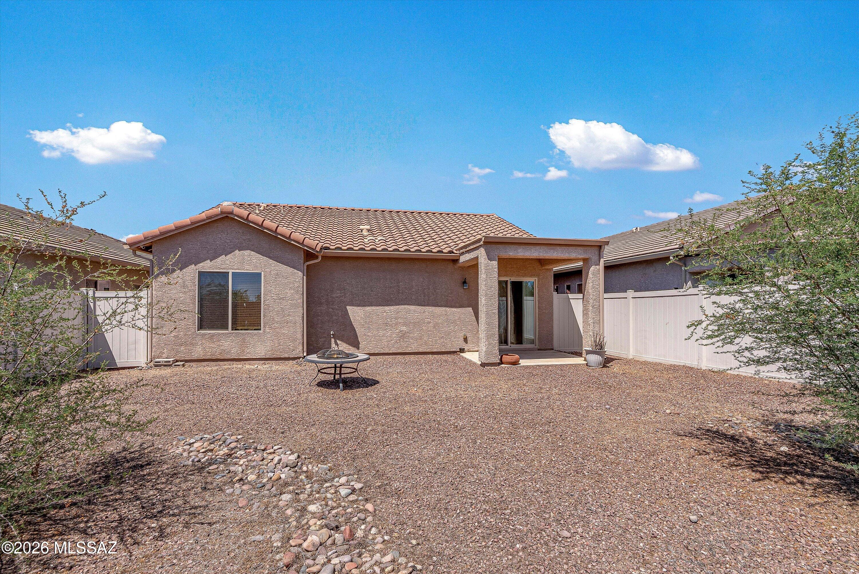 21163 East Treasure Road Red Rock, AZ 85145 - Photo 25 of 35 a view of a house with a yard and garage