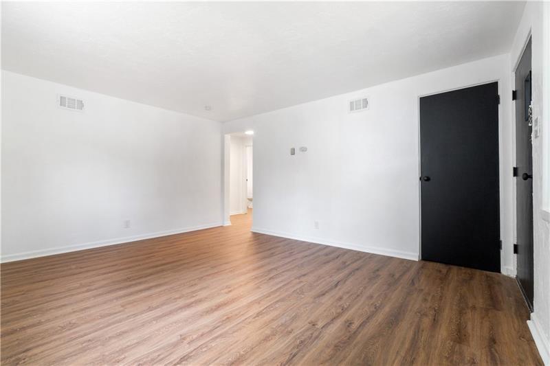 546 Old Frankstown Road Monroeville, PA 15146 - Photo 13 of 47 a view of an empty room with wooden floor