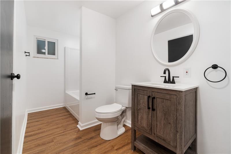 546 Old Frankstown Road Monroeville, PA 15146 - Photo 16 of 47 a bathroom with a toilet sink and mirror