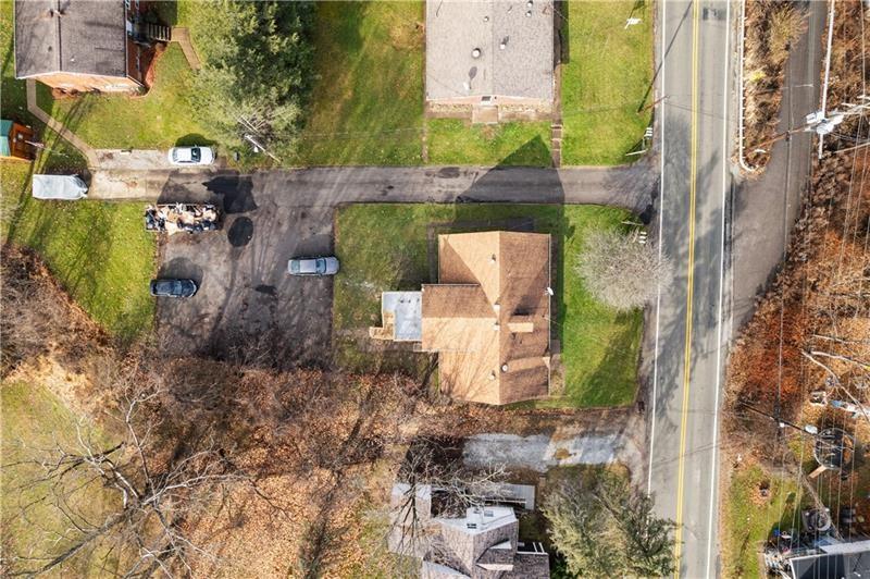 546 Old Frankstown Road Monroeville, PA 15146 - Photo 45 of 47 an aerial view of a house with a yard and large trees