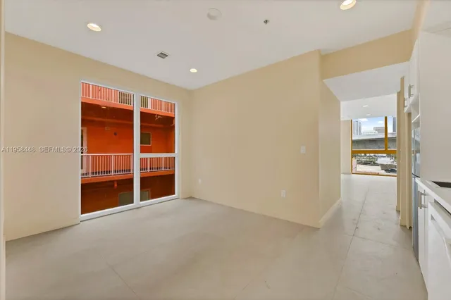 an empty room with red walls