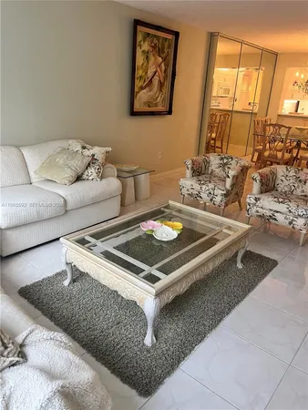 a living room with a couch and a table