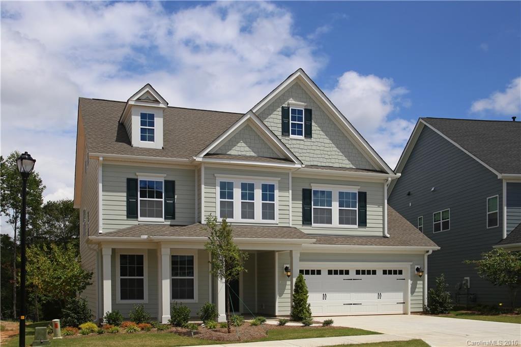 1033 Emory Lane, Unit 70 Fort Mill, SC 29708 - Photo 1 of 21 a front view of a house with a garage
