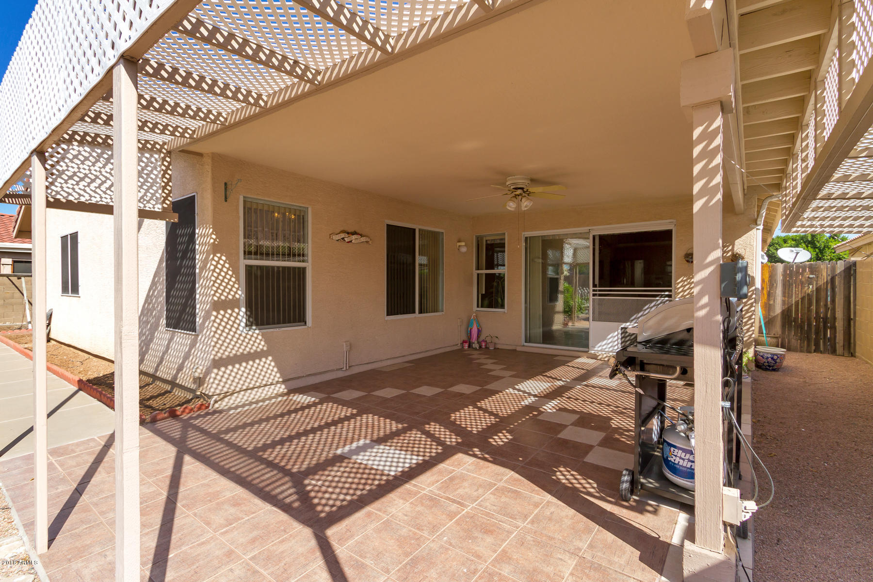 3941 West Charter Oak Road Phoenix, AZ 85029 - Photo 21 of 25 a view of a house with wooden floor and chair