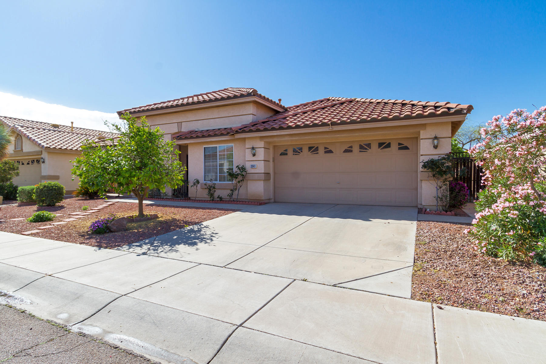 3941 West Charter Oak Road Phoenix, AZ 85029 - Photo 25 of 25 a view of a house with a yard and potted plants