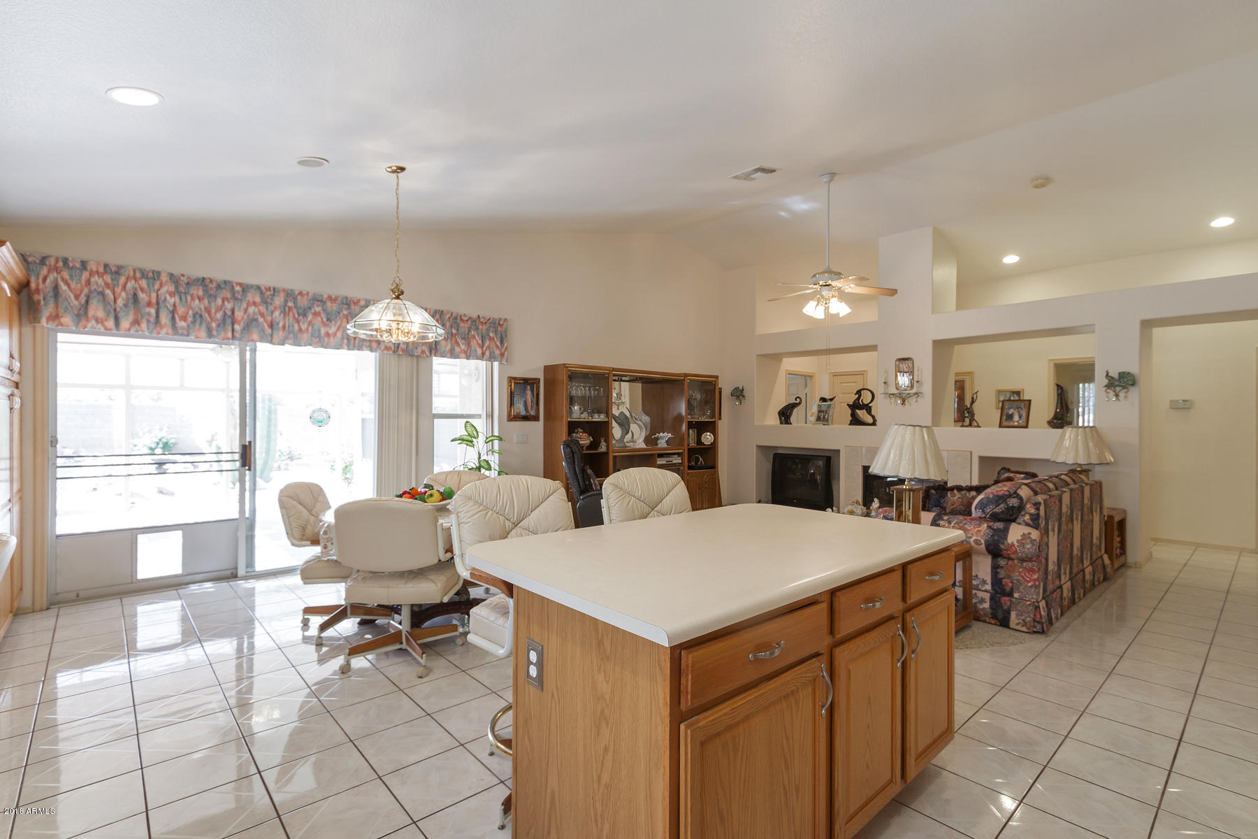 3941 West Charter Oak Road Phoenix, AZ 85029 - Photo 5 of 25 a living room with furniture a table and chairs